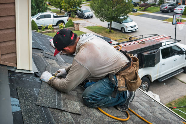 Professional Roofing technician working in Lowman, NY